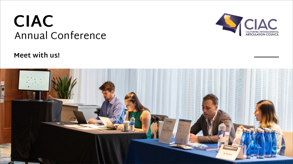 Four trade show attendees at conference tables.